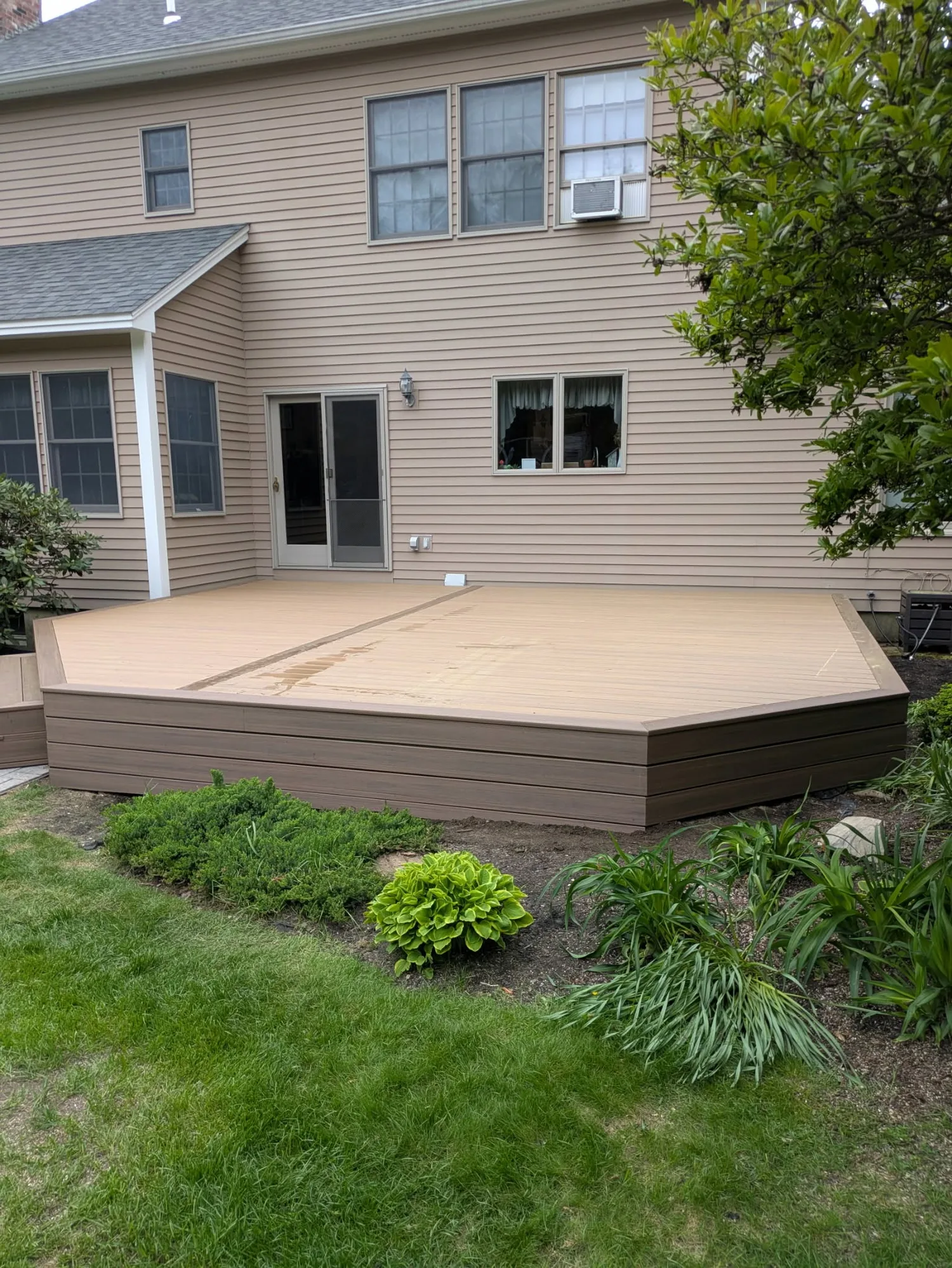 Custom deck by Stronghold Deck Company · Central Maine